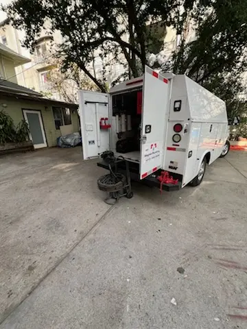 Magnet Plumbing service vehicle on-site for Grease Trap Cleaning in Sandestin